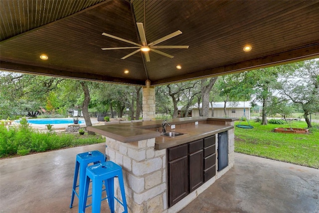 9840 N Live Oak Rd, Salado, TX 76571 - view of patio / terrace featuring area for grilling, an outdoor pool, and ceiling fan