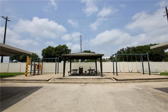 view of community with fence