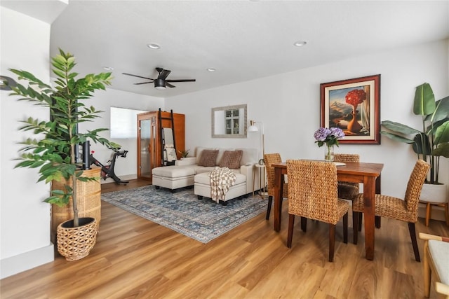 dining space featuring light wood-type flooring, recessed lighting, and ceiling fan