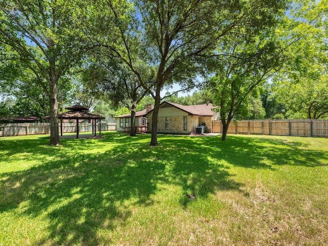 3606 Spotted Horse Trl, Austin, TX 78739 - fenced backyard featuring a gazebo