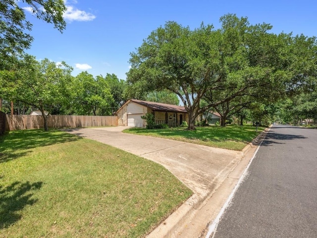 3606 Spotted Horse Trl, Austin, TX 78739 - view of front facade with concrete driveway and an attached garage