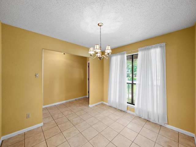 3606 Spotted Horse Trl, Austin, TX 78739 - unfurnished room with a chandelier, a textured ceiling, and light tile patterned flooring