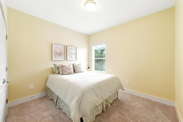7308 Oberon St, Austin, TX 78741 - bedroom with light carpet and baseboards
