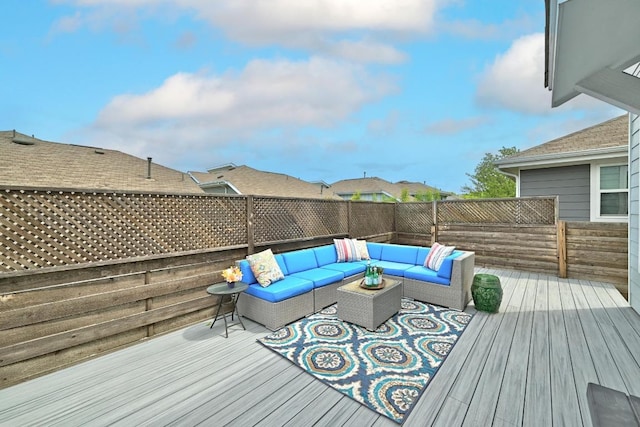 7308 Oberon St, Austin, TX 78741 - deck featuring outdoor lounge area and a fenced backyard
