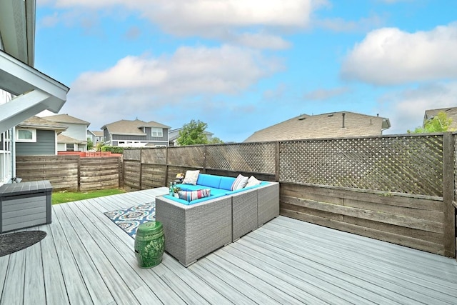 7308 Oberon St, Austin, TX 78741 - deck with an outdoor hangout area and a fenced backyard
