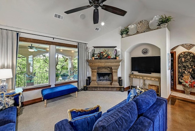 2600 Grapevine Springs Cv, Georgetown, TX 78628 - living room featuring ceiling fan, a fireplace with raised hearth, high vaulted ceiling, and baseboards
