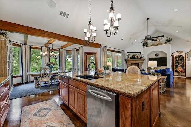 2600 Grapevine Springs Cv, Georgetown, TX 78628 - kitchen with dishwasher, a chandelier, a sink, an island with sink, and a ceiling fan
