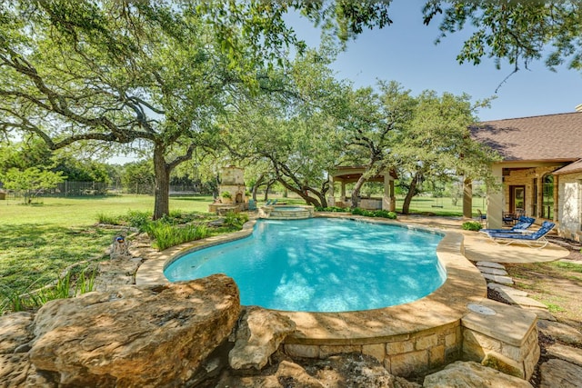 1186 Ranchers Club Ln, Driftwood, TX 78619 - view of swimming pool featuring a patio and a pool with connected hot tub