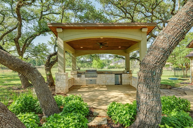 1186 Ranchers Club Ln, Driftwood, TX 78619 - view of patio / terrace featuring area for grilling, ceiling fan, fence, grilling area, and a gazebo