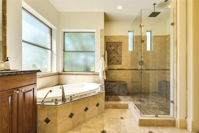 1186 Ranchers Club Ln, Driftwood, TX 78619 - bathroom featuring a shower stall, a bath, plenty of natural light, and tile patterned floors