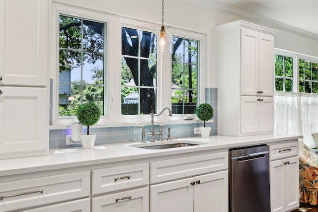 bar with a sink, stainless steel dishwasher, crown molding, backsplash, and hanging light fixtures