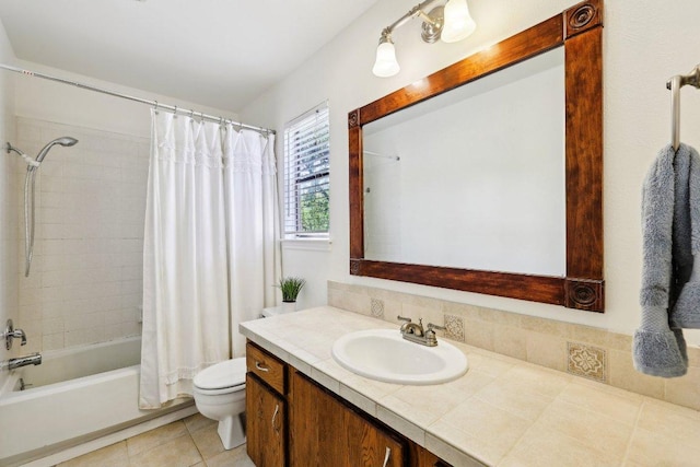 bathroom featuring toilet, vanity, shower / tub combo with curtain, and tile patterned flooring