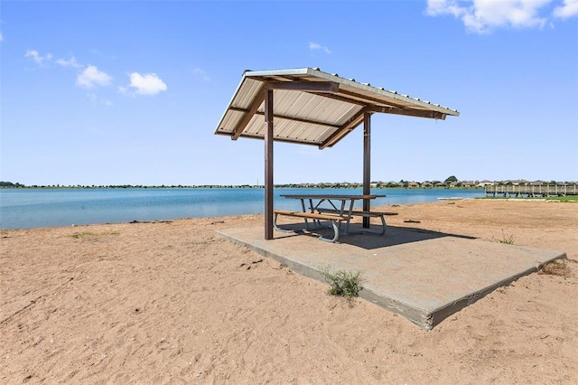 view of home's community with a water view