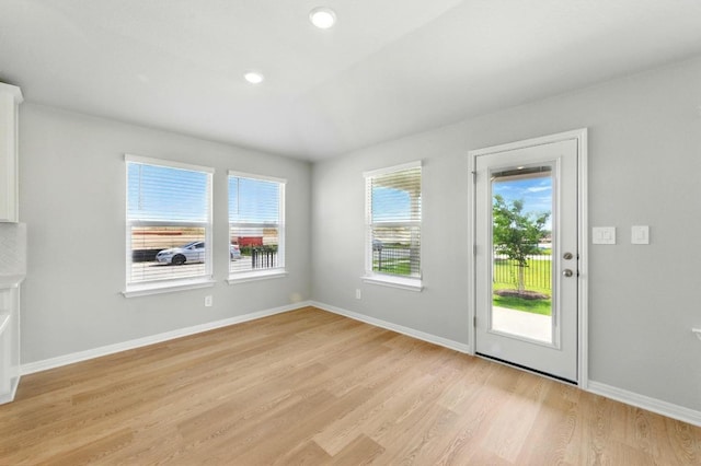 17129 Loch Rd, Pflugerville, TX 78660 - unfurnished living room featuring light wood finished floors and recessed lighting