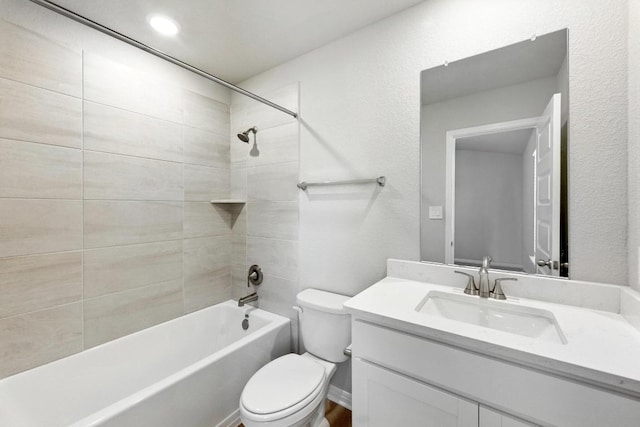 full bathroom with toilet, vanity, and bathing tub / shower combination