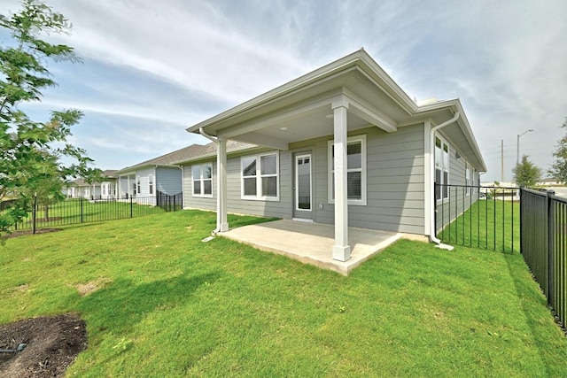 back of property featuring a patio area
