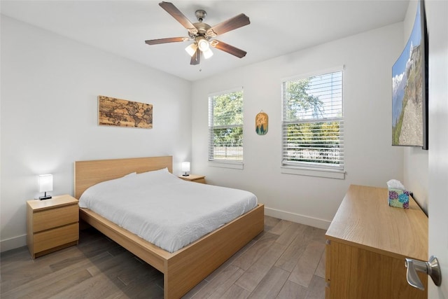 21513 Santa Carlo Ave, Lago Vista, TX 78645 - bedroom with light wood-style flooring and ceiling fan