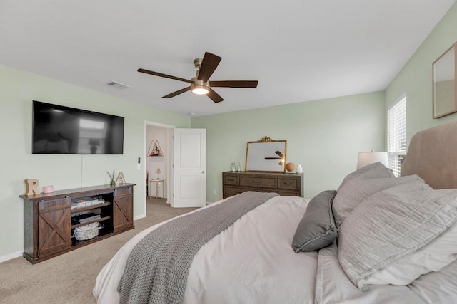 17913 Shafer Dr, Pflugerville, TX 78660 - bedroom featuring light colored carpet, a ceiling fan, and baseboards