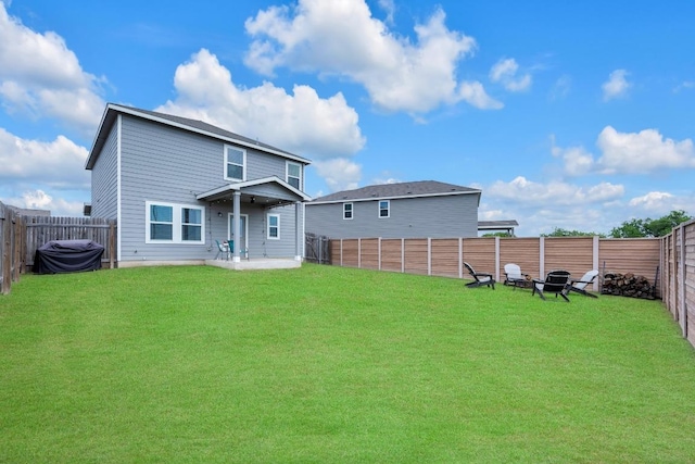 17913 Shafer Dr, Pflugerville, TX 78660 - rear view of house with an outdoor fire pit and a patio