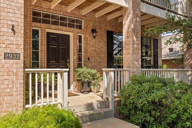 2932 Persimmon Valley Trl, Austin, TX 78732 - view of exterior entry featuring covered porch and brick siding