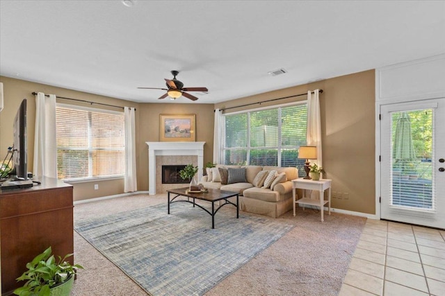 2932 Persimmon Valley Trl, Austin, TX 78732 - living room with light colored carpet, plenty of natural light, ceiling fan, and baseboards