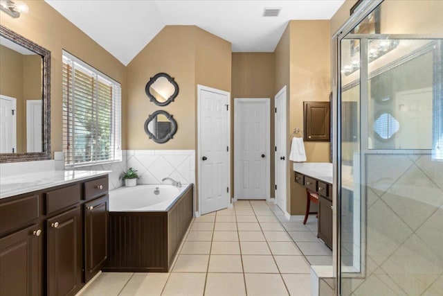 2932 Persimmon Valley Trl, Austin, TX 78732 - full bathroom with a stall shower, a bath, tile patterned flooring, and vanity