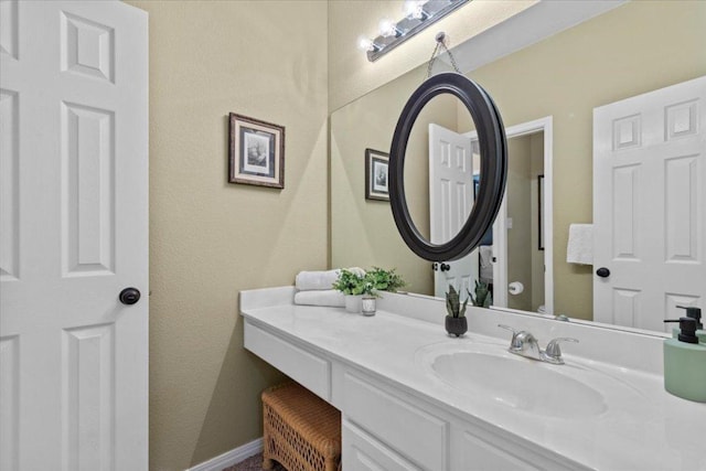 2932 Persimmon Valley Trl, Austin, TX 78732 - bathroom with vanity, baseboards, and toilet