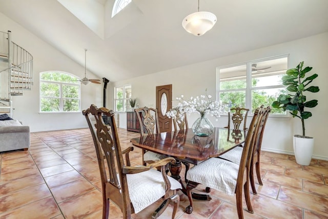 195 Live Oak, Liberty Hill, TX 78642 - dining space featuring baseboards, vaulted ceiling, stairway, light tile patterned flooring, and a ceiling fan
