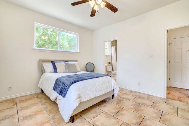 195 Live Oak, Liberty Hill, TX 78642 - bedroom featuring multiple windows, baseboards, and light tile patterned floors