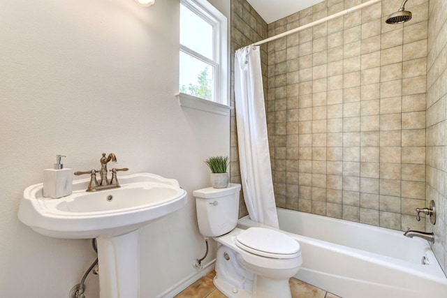 195 Live Oak, Liberty Hill, TX 78642 - full bathroom with toilet, tile patterned flooring, shower / tub combo, and baseboards