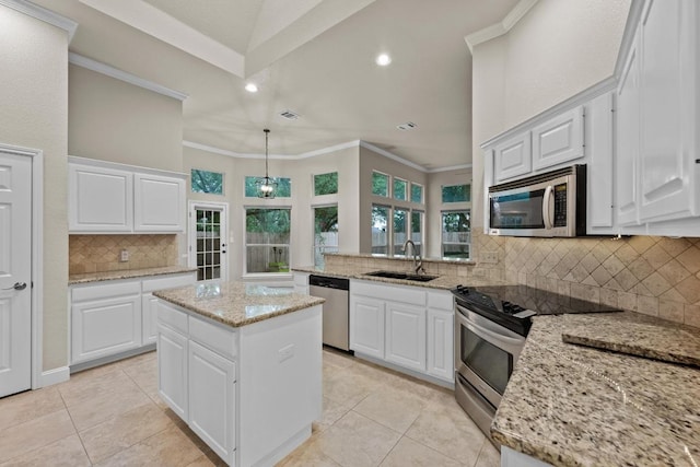 3408 Reims Ct, Austin, TX 78738 - kitchen featuring stainless steel appliances, a sink, tasteful backsplash, light tile patterned flooring, and recessed lighting