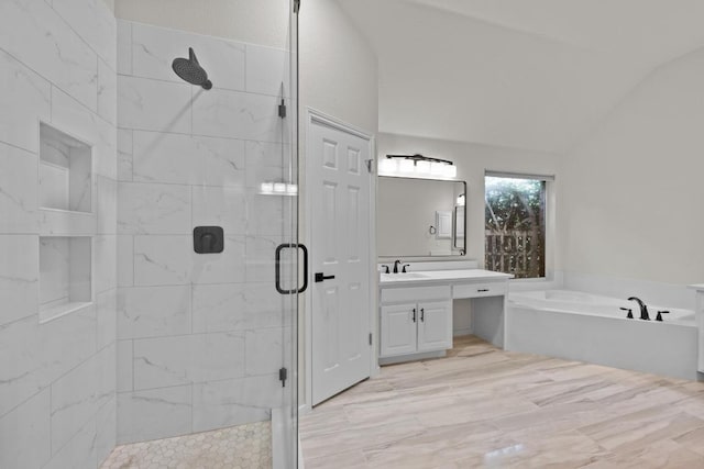 3408 Reims Ct, Austin, TX 78738 - full bathroom featuring a stall shower, vanity, a garden tub, and lofted ceiling