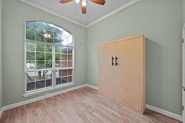 3408 Reims Ct, Austin, TX 78738 - unfurnished bedroom featuring crown molding, light wood finished floors, and a ceiling fan