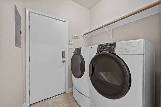 3408 Reims Ct, Austin, TX 78738 - laundry room with washer and dryer, light tile patterned flooring, electric panel, and baseboards