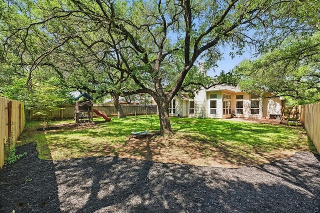 view of yard featuring a playground