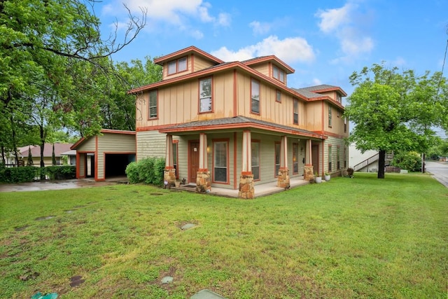 5401 Duval St Unit A & B, Austin, TX 78751 - view of front of property featuring board and batten siding, covered porch, a front lawn, and a garage