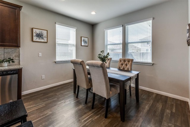 dining area with baseboards, dark wood-style floors, and recessed lighting