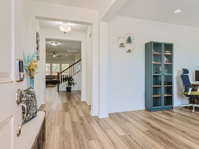 4325 Arques Ave, Round Rock, TX 78681 - entryway featuring light wood-style flooring, ceiling fan, stairway, and baseboards
