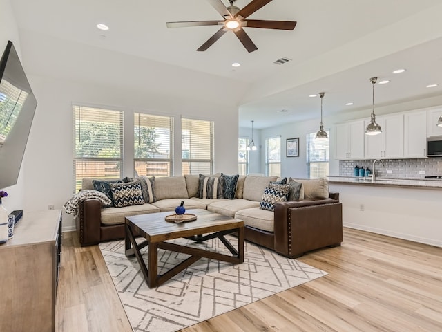 4325 Arques Ave, Round Rock, TX 78681 - living area featuring ceiling fan, light wood-type flooring, and recessed lighting
