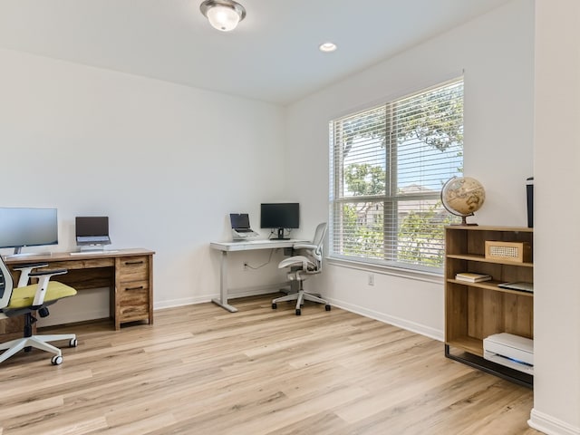 4325 Arques Ave, Round Rock, TX 78681 - office featuring light wood-style floors, baseboards, and recessed lighting