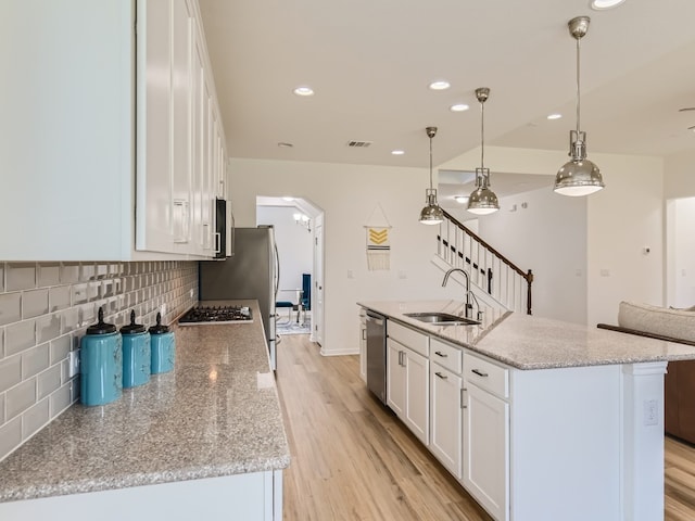 4325 Arques Ave, Round Rock, TX 78681 - kitchen featuring a sink, dishwasher, white cabinets, tasteful backsplash, and recessed lighting