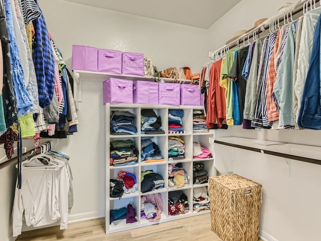 4325 Arques Ave, Round Rock, TX 78681 - walk in closet featuring wood finished floors