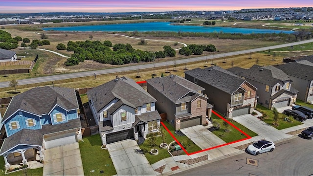 424 Turnbuckle Bnd, Leander, TX 78641 - aerial view at dusk of a water view and a residential view