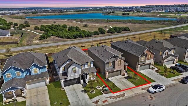 424 Turnbuckle Bnd, Leander, TX 78641 - aerial view at dusk of a water view and a residential view