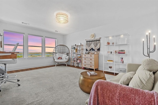 424 Turnbuckle Bnd, Leander, TX 78641 - living room featuring wood finished floors, an office area, and baseboards