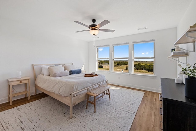 424 Turnbuckle Bnd, Leander, TX 78641 - bedroom featuring light wood-style flooring, baseboards, and ceiling fan