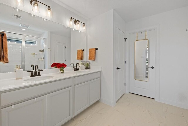 424 Turnbuckle Bnd, Leander, TX 78641 - full bath with double vanity, marble finish floors, and a stall shower