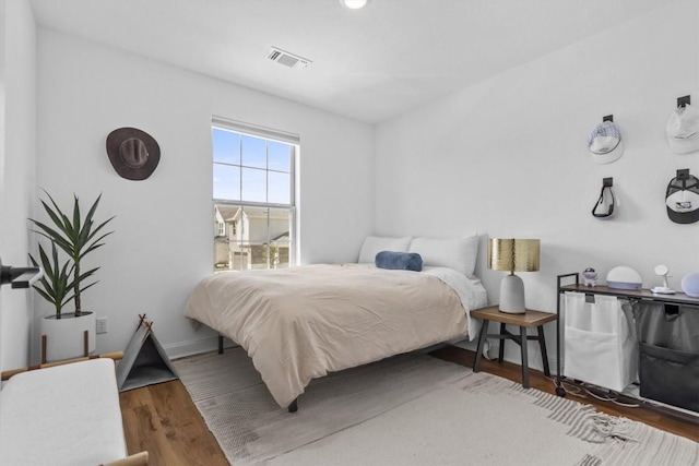 424 Turnbuckle Bnd, Leander, TX 78641 - bedroom featuring wood finished floors