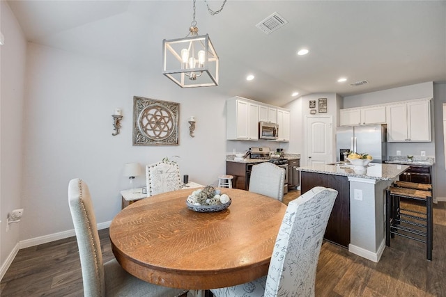 dining space featuring lofted ceiling, dark wood-style flooring, baseboards, a chandelier, and recessed lighting