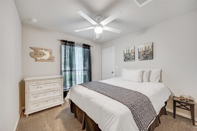 bedroom featuring carpet floors, baseboards, and ceiling fan